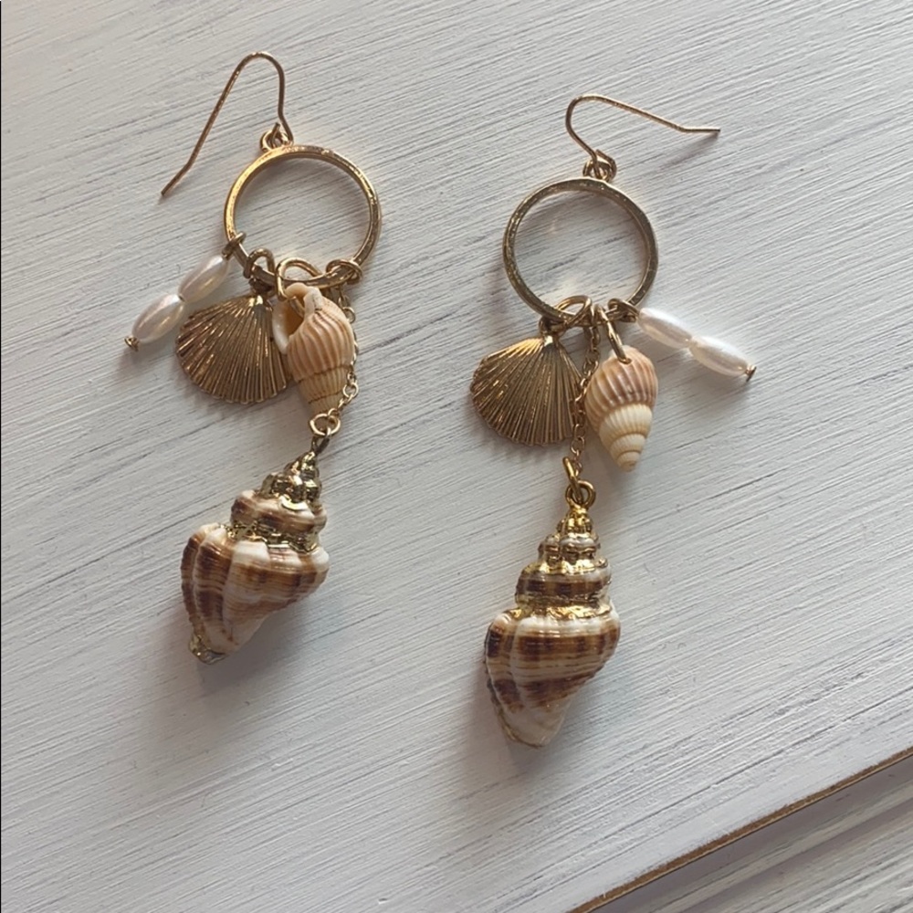 dangly gold seashell earrings